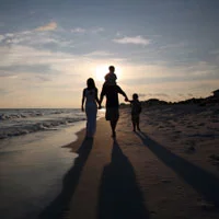 Homeschool family gentle walk on the beach