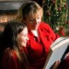 Homeschool mom and daughter reading at Christmas