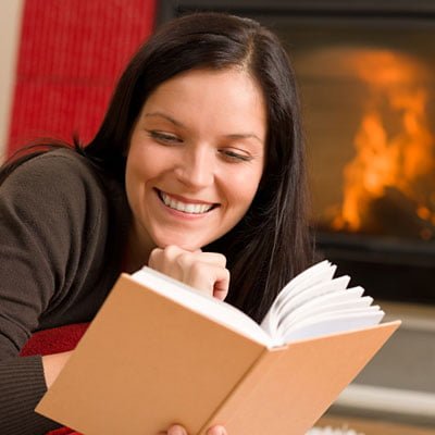 Reading by the fireplace