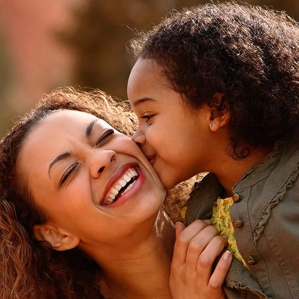 homeschool mom and daughter laughing