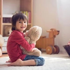 Boy with teddy bear